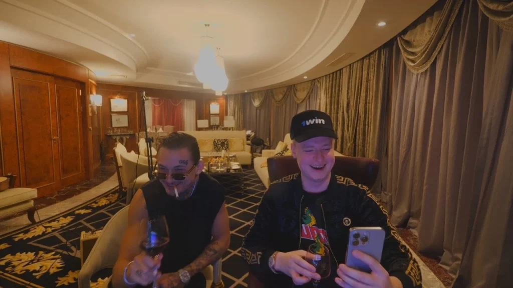 Mellstroy with Morgenstern in a living room with drinks